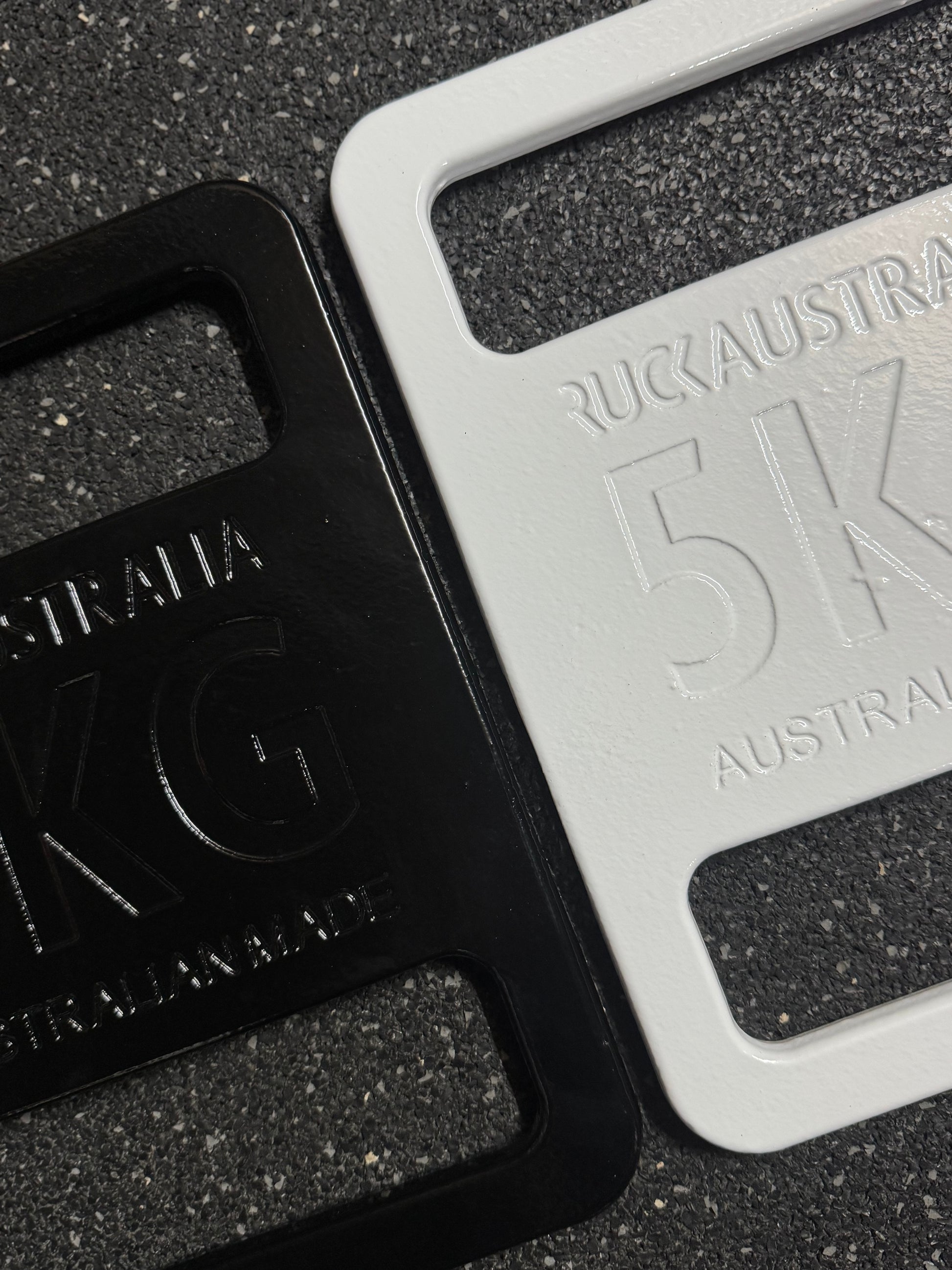 Weighted ruck plates black and white